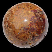 Teardrop Jasper sphere 313g in sunlight - Rocks and Things Store