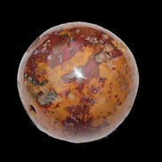 Teardrop Jasper sphere 313g in sunlight - Rocks and Things Store