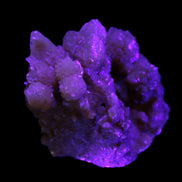 Orange Calcite cluster 45*50mm 68g in UV light