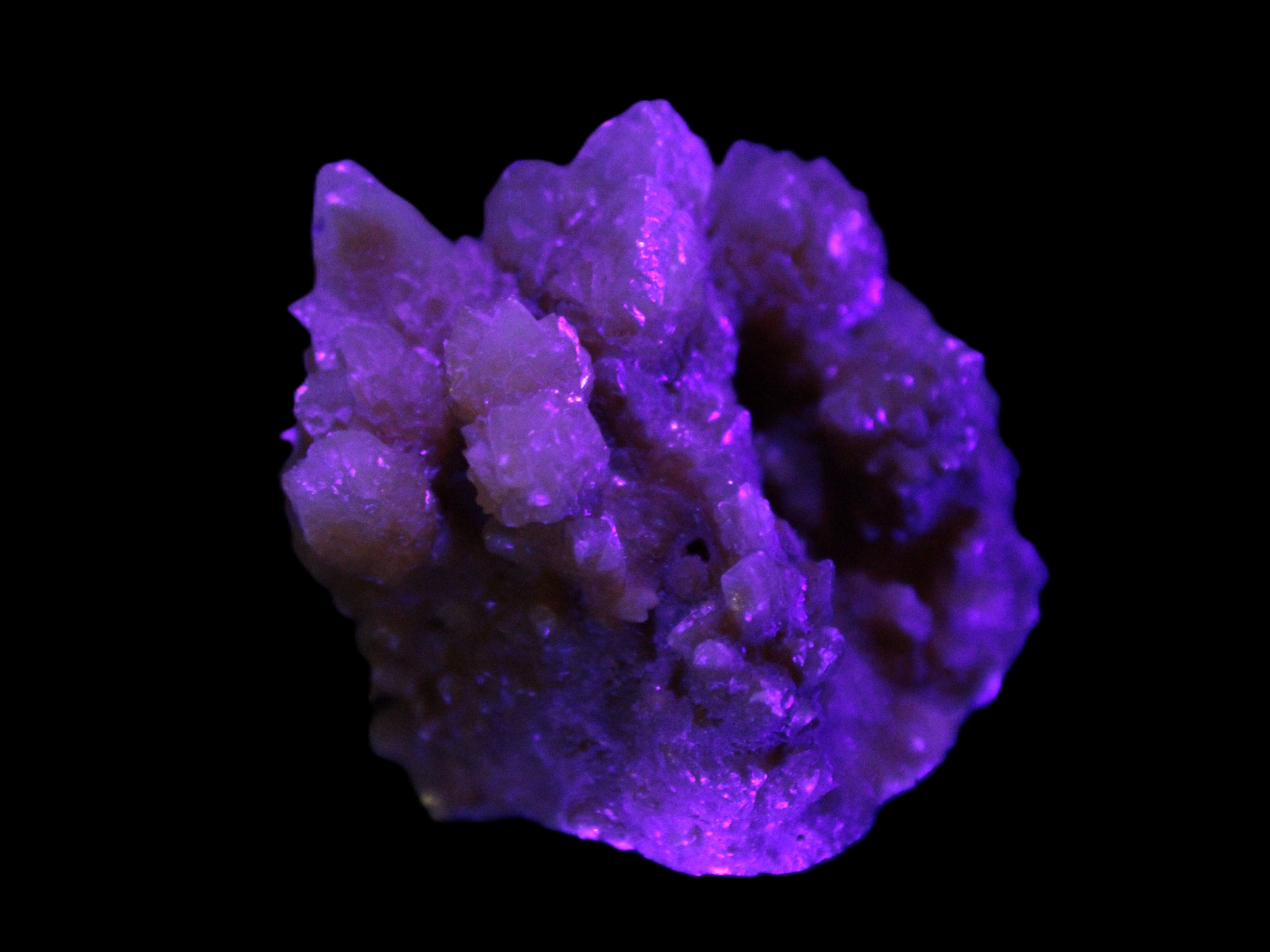Orange Calcite cluster 45*50mm 68g in UV light