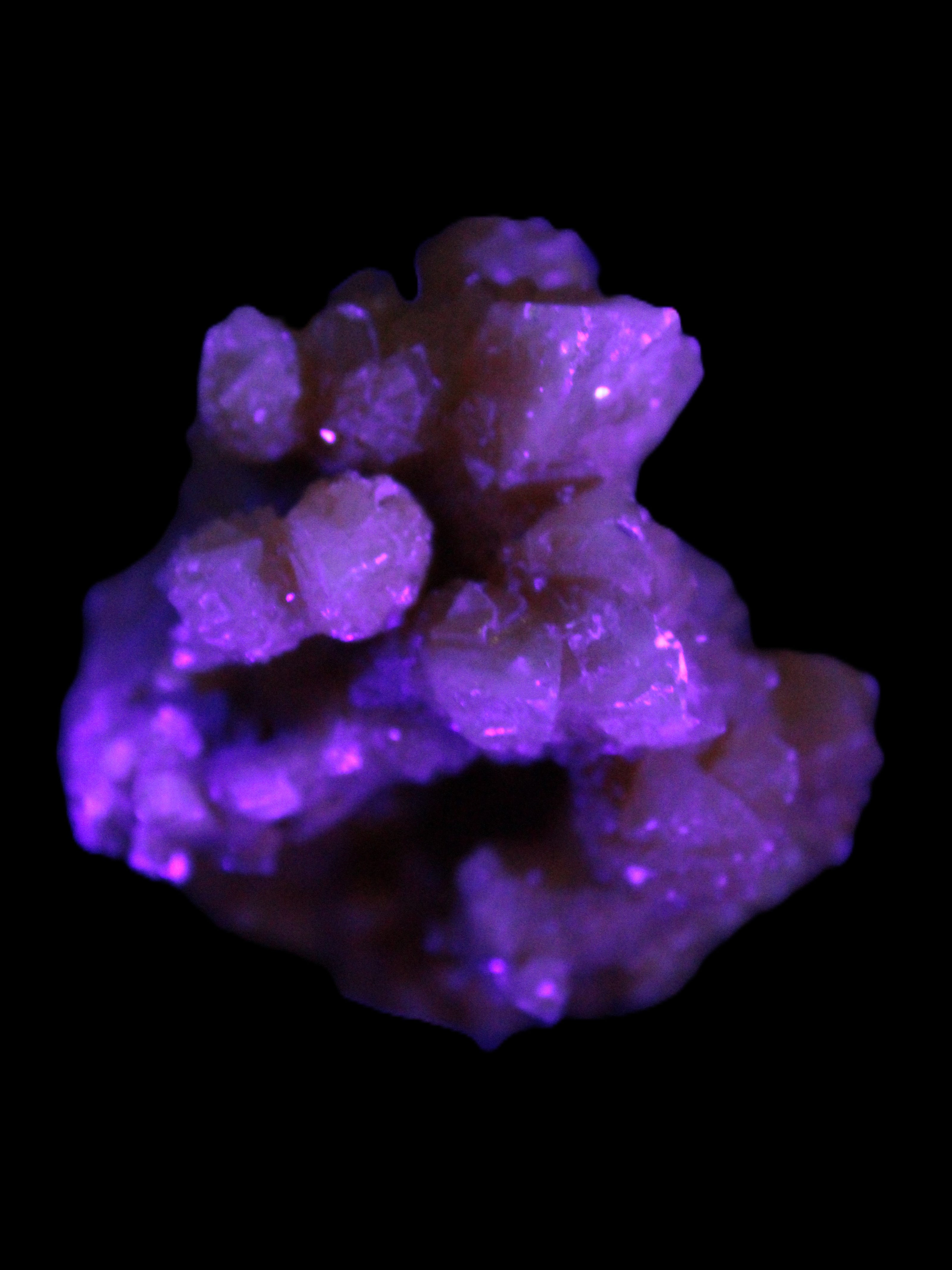 Orange Calcite cluster 45*50mm 68g in UV light