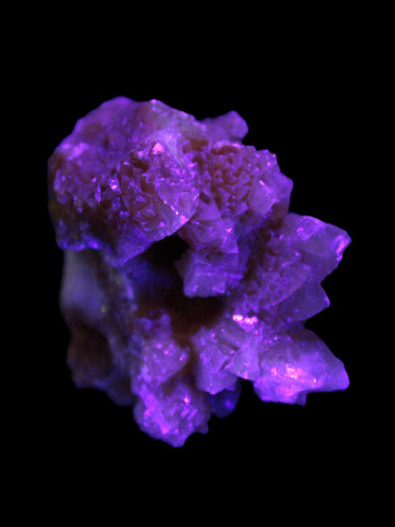 Orange Calcite cluster 45*50mm 68g in UV light