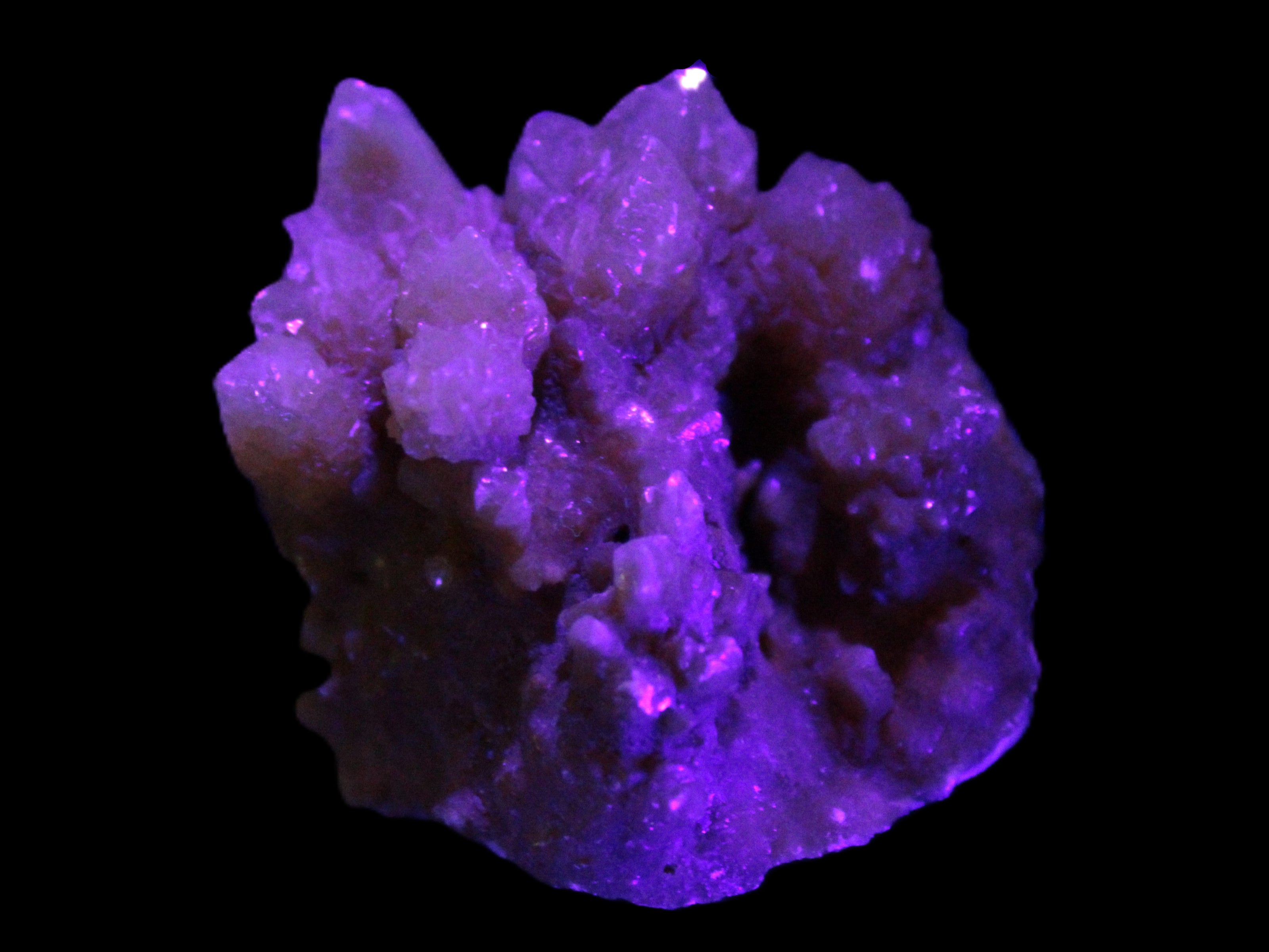 Orange Calcite cluster 45*50mm 68g in UV light
