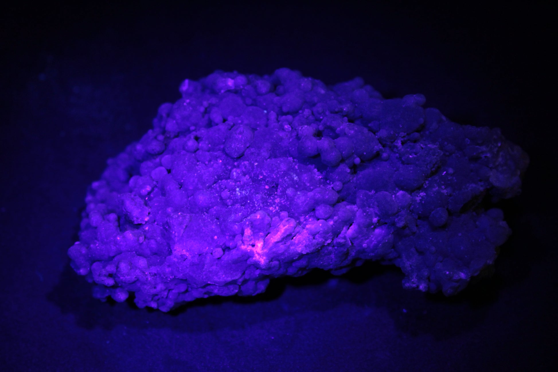 Purple Grape Agate bubbles in UV light