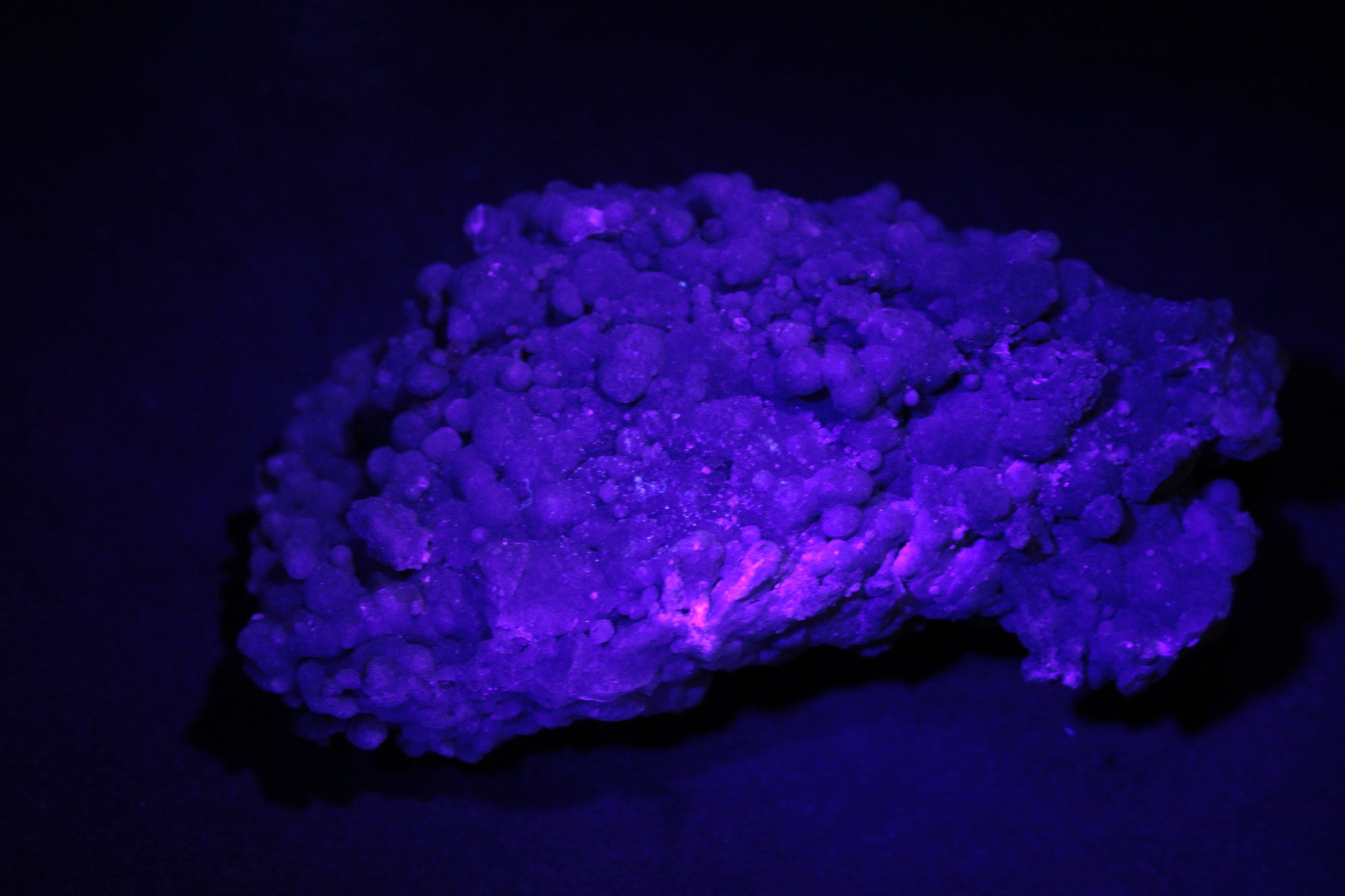 Purple Grape Agate bubbles in UV light