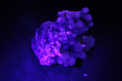 Purple Grape Agate bubbles in UV light