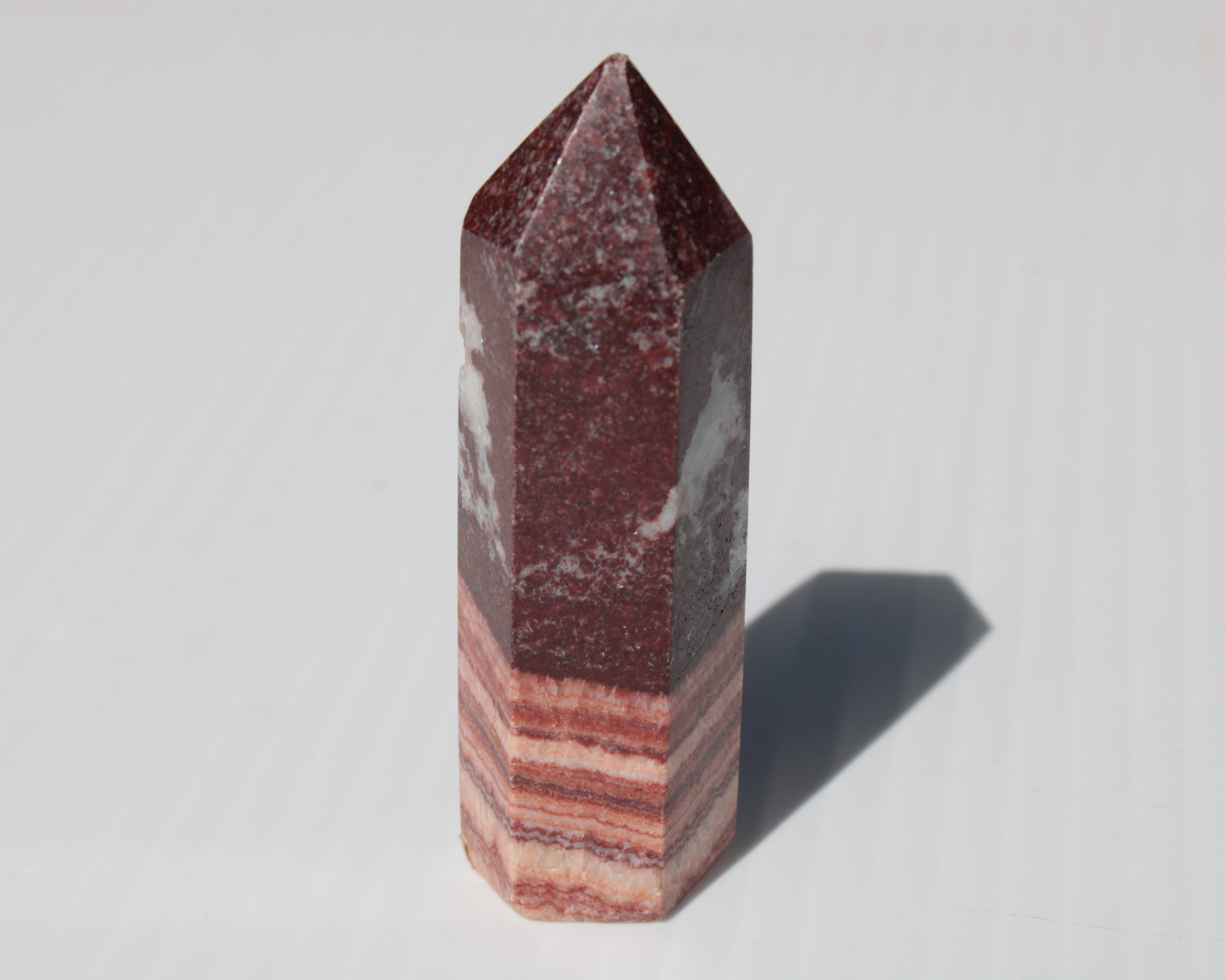 Rhodochrosite wand 59.8g Rocks and Things