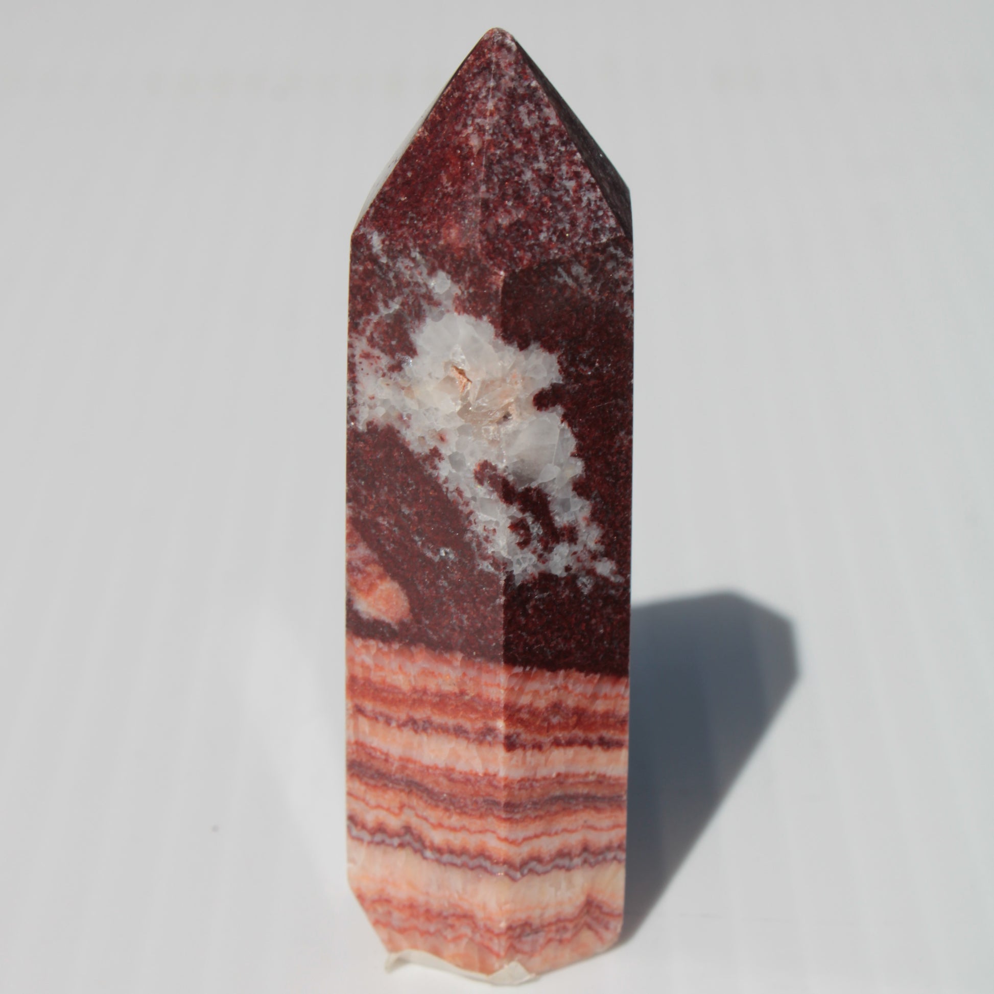 Rhodochrosite wand 59.8g Rocks and Things