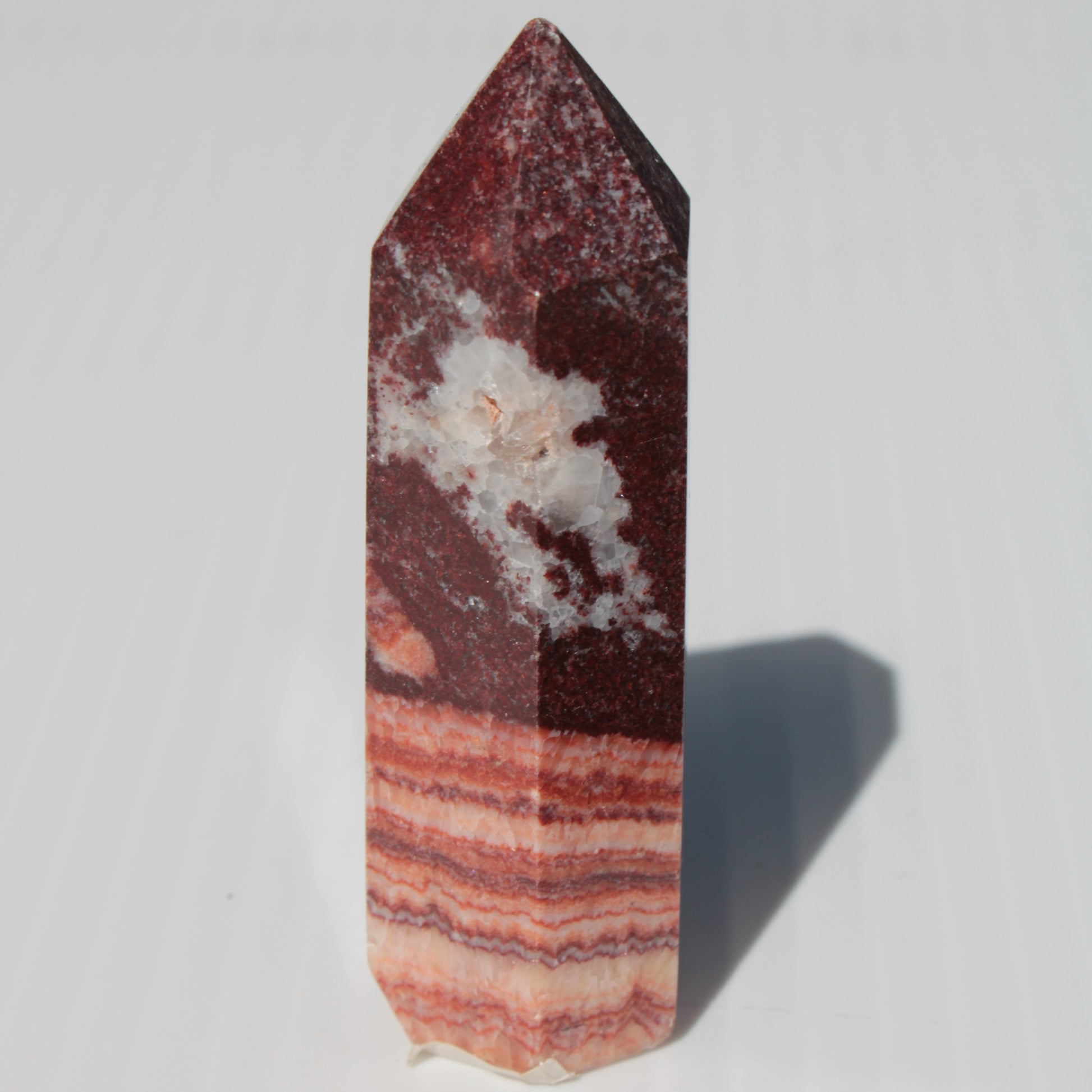 Rhodochrosite wand 59.8g Rocks and Things