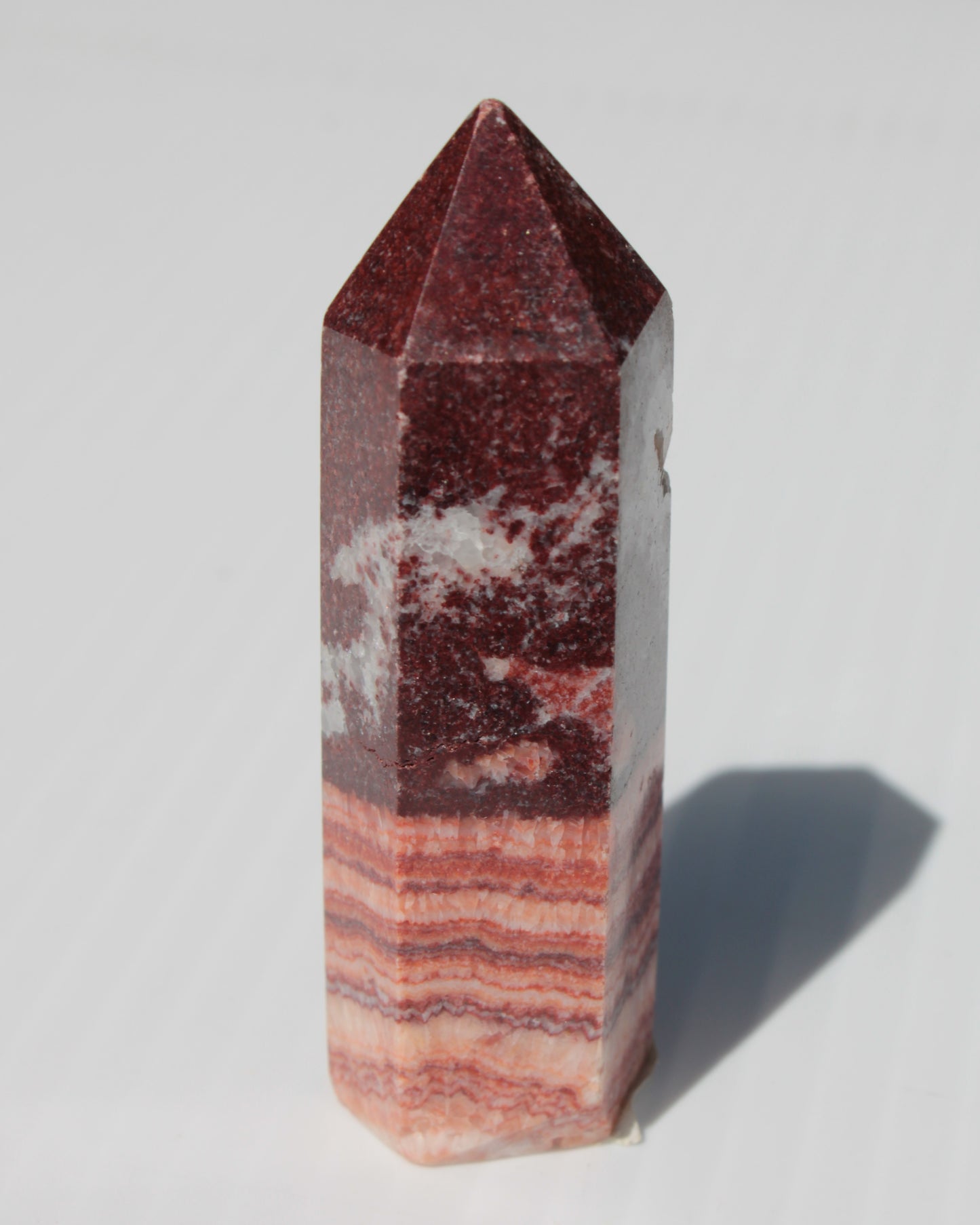 Rhodochrosite wand 59.8g Rocks and Things