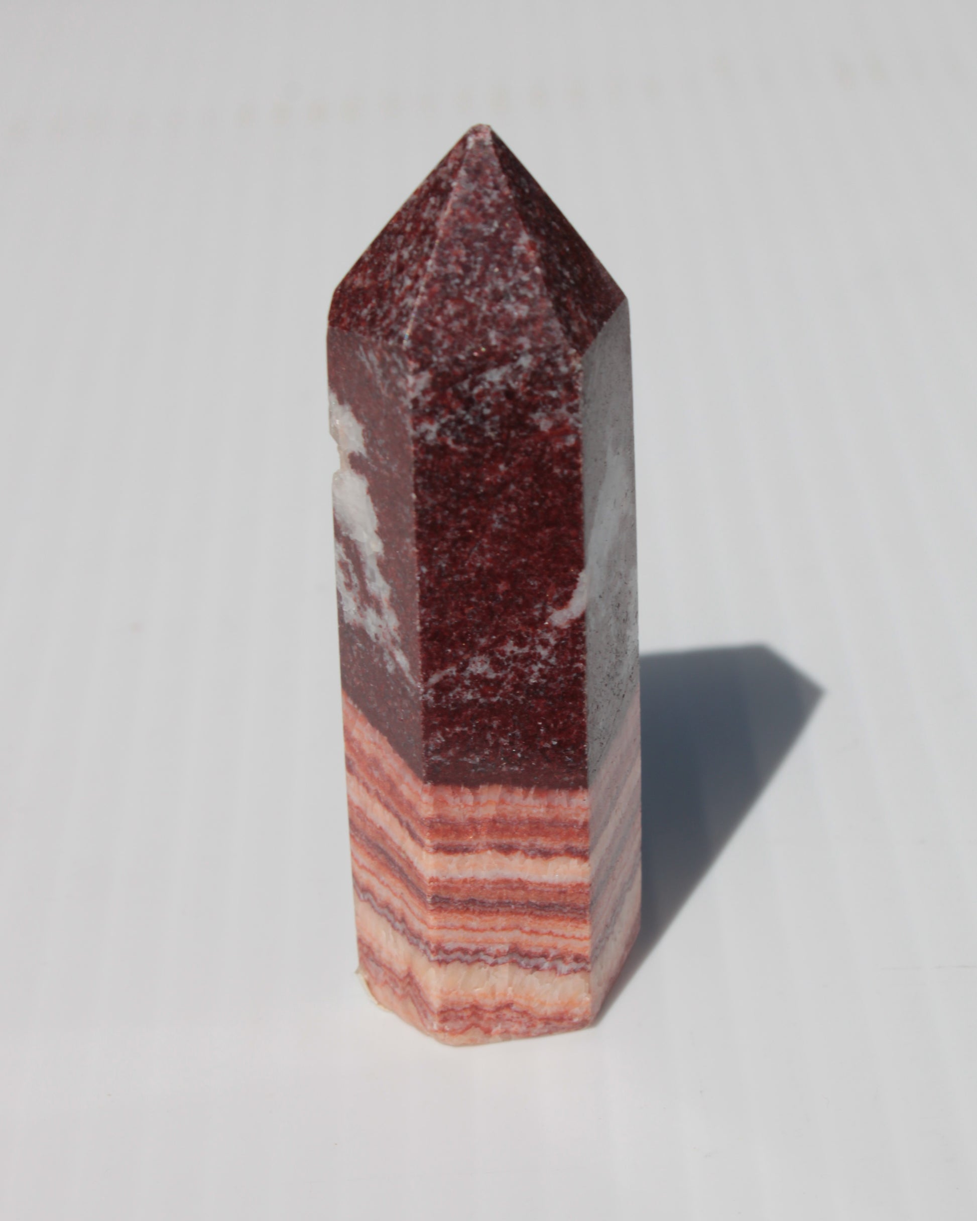 Rhodochrosite wand 59.8g Rocks and Things