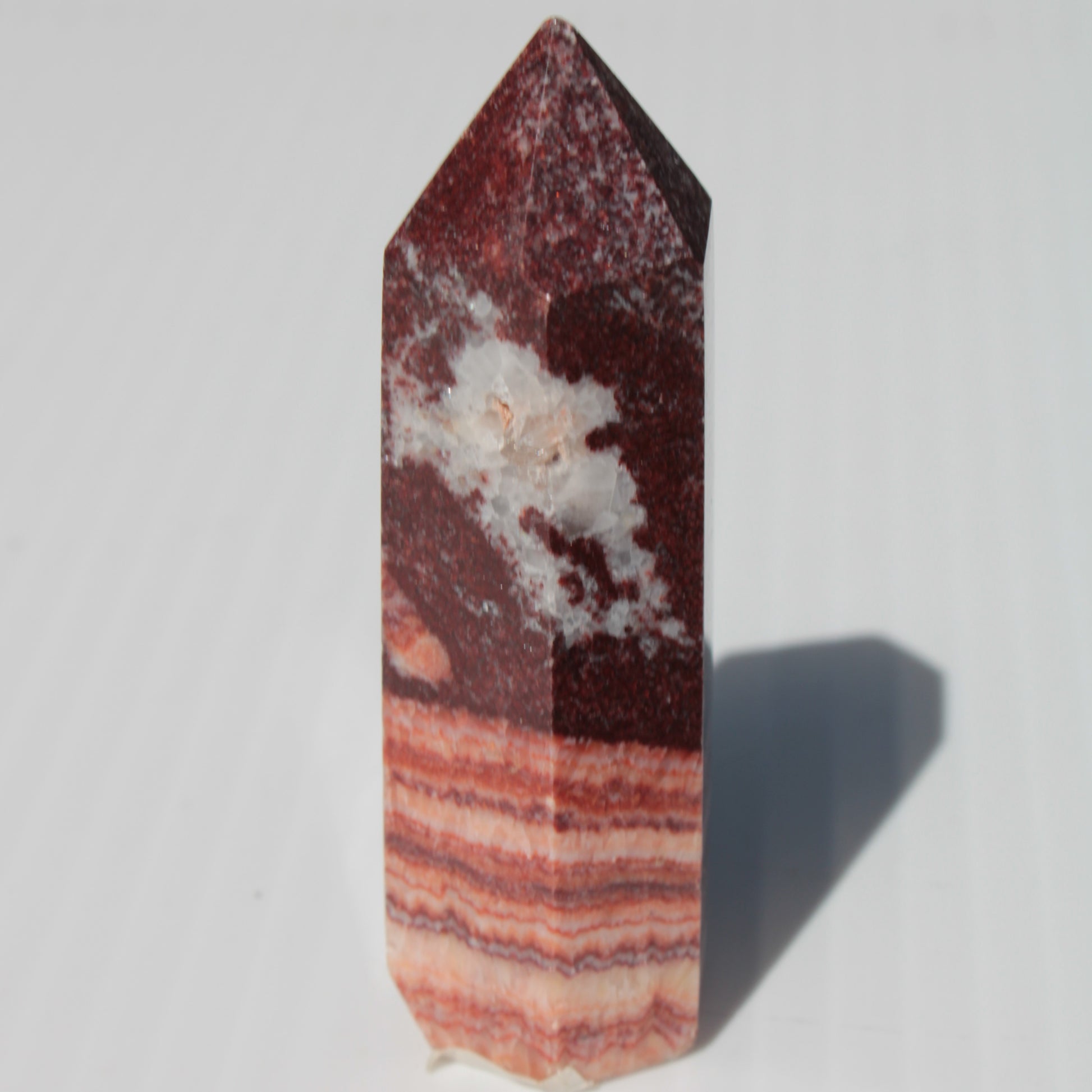 Rhodochrosite wand 59.8g Rocks and Things