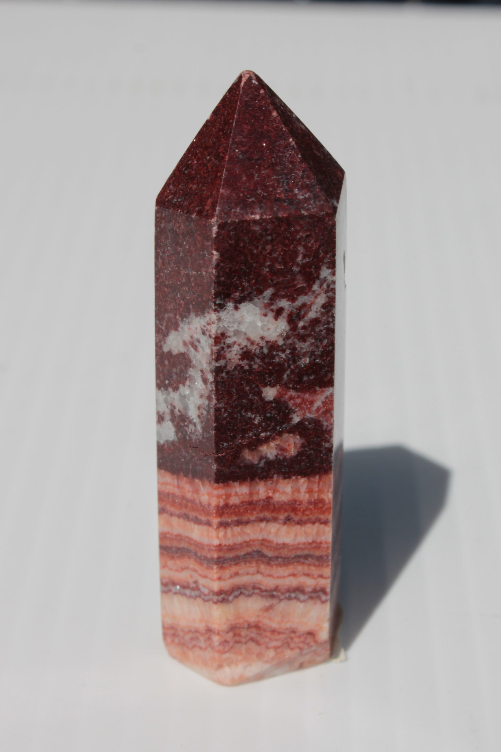 Rhodochrosite wand 59.8g Rocks and Things