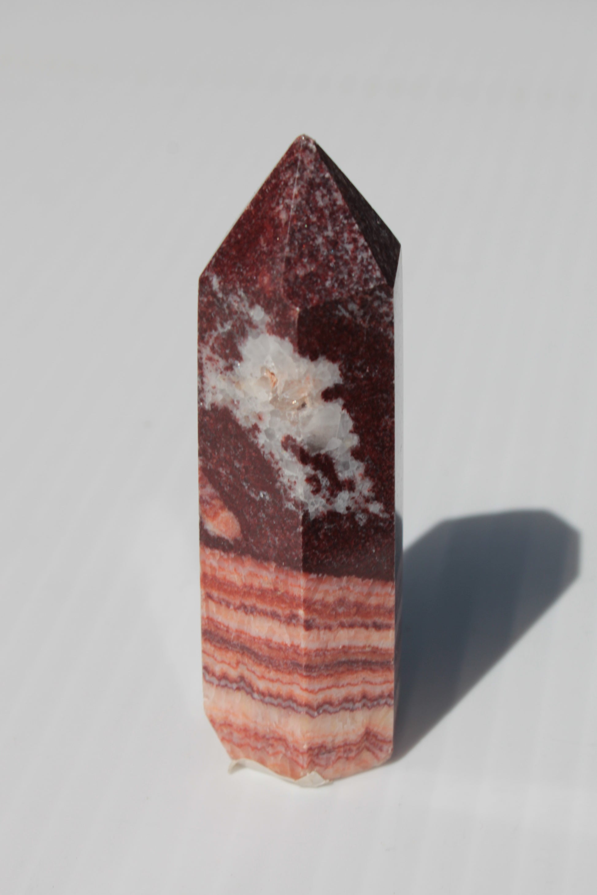 Rhodochrosite wand 59.8g Rocks and Things