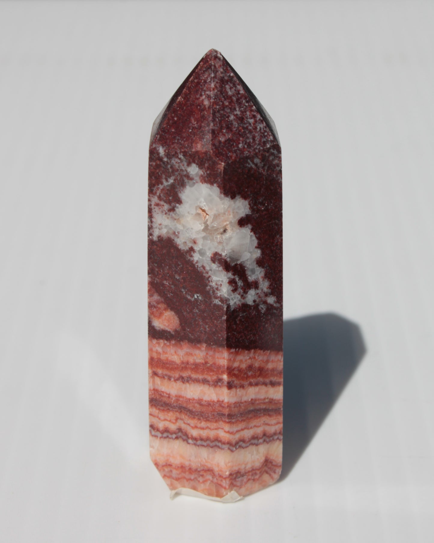 Rhodochrosite wand 59.8g Rocks and Things