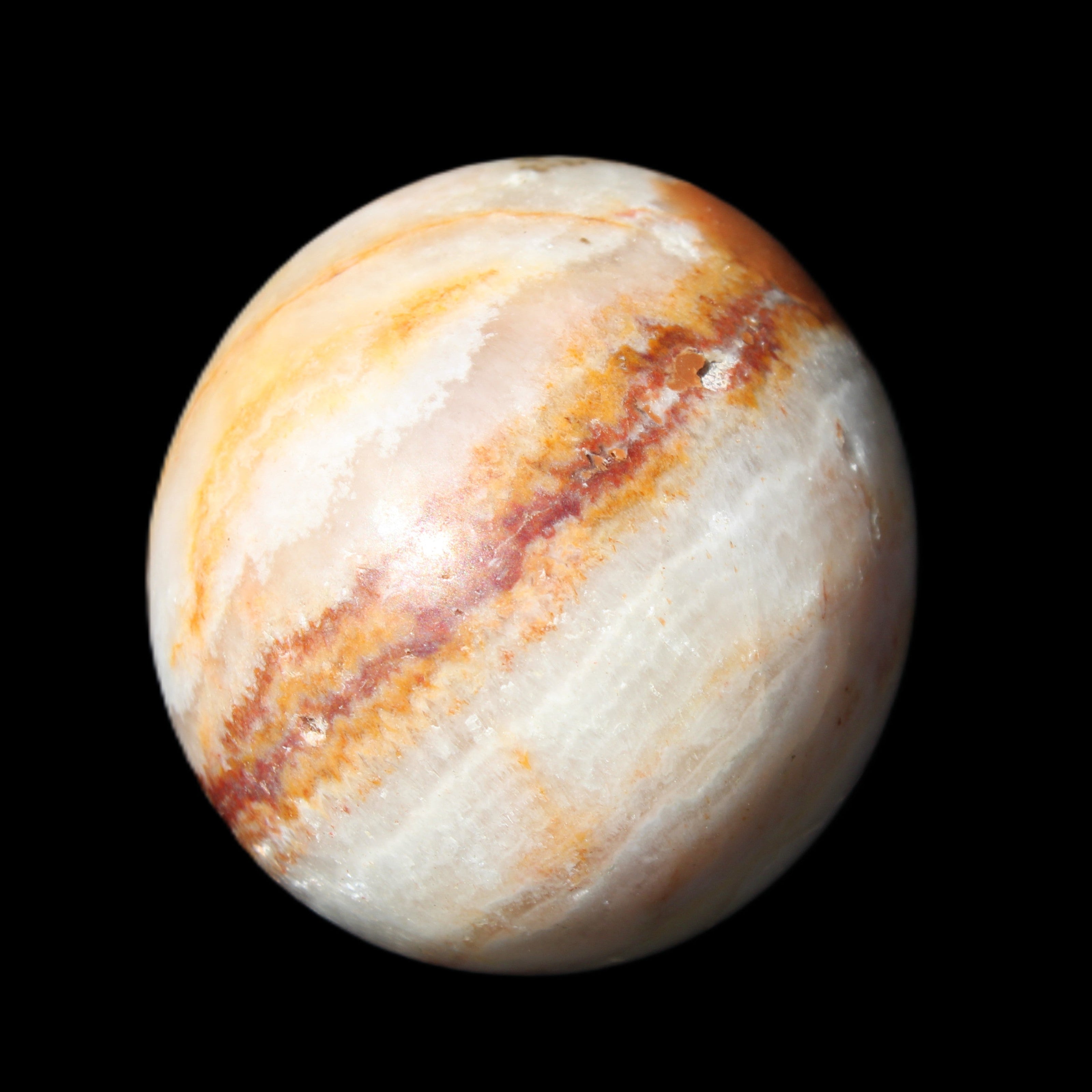 Rhodochrosite egg 70*48mm 264g in sunlight - Rocks and Things Store