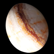 Rhodochrosite egg 70*48mm 264g in sunlight - Rocks and Things Store