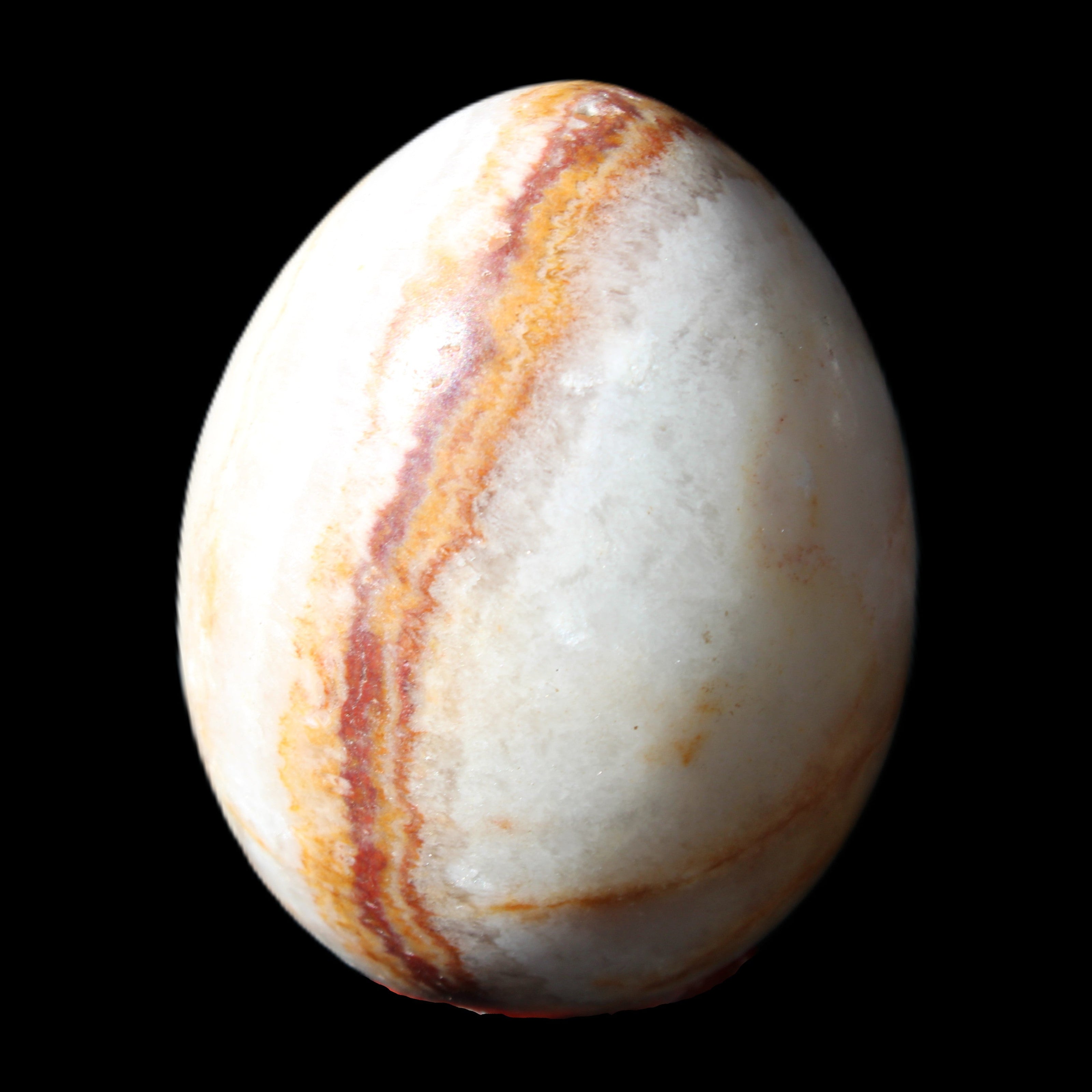 Rhodochrosite egg 70*48mm 264g in sunlight - Rocks and Things Store