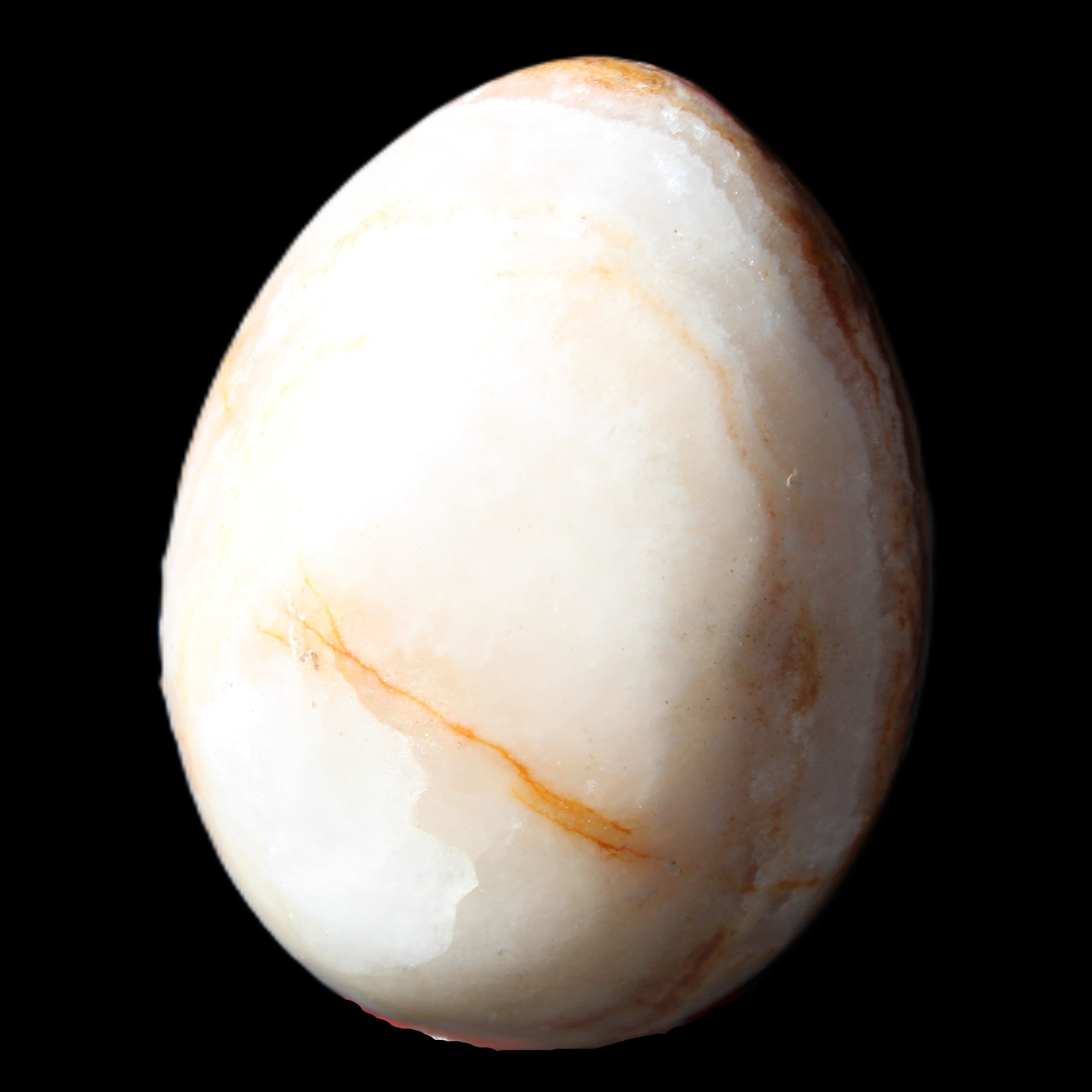 Rhodochrosite egg 70*48mm 264g in sunlight - Rocks and Things Store