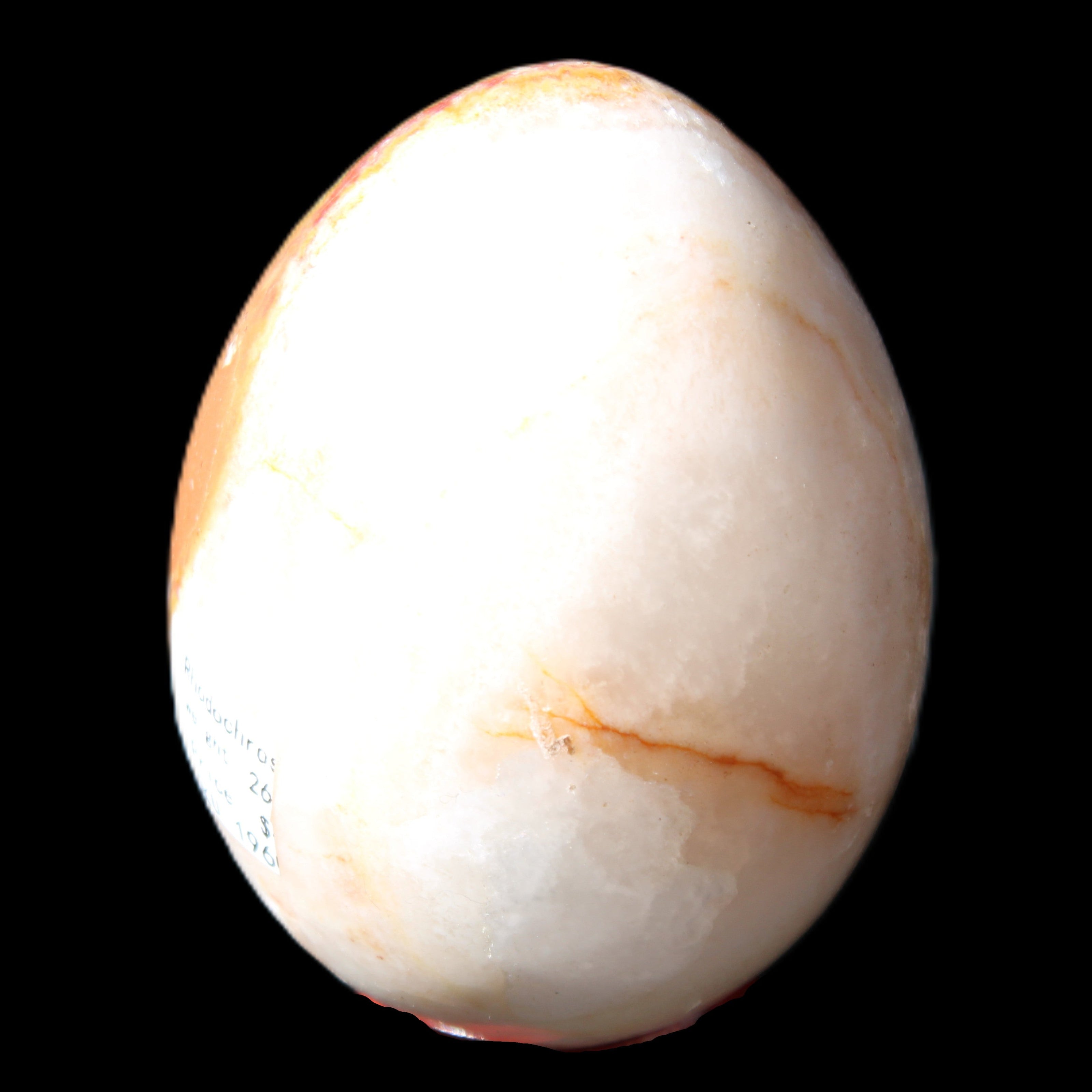 Rhodochrosite egg 70*48mm 264g in sunlight - Rocks and Things Store