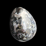 Indigo Gabbro Mystic Merlinite egg 111g in sunlight - Rocks and Things Store