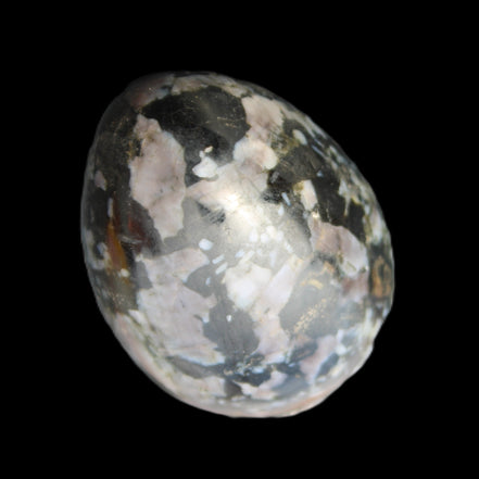 Indigo Gabbro Mystic Merlinite egg 111g in sunlight - Rocks and Things Store