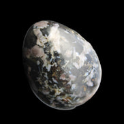 Indigo Gabbro Mystic Merlinite egg 111g in sunlight - Rocks and Things Store