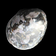 Indigo Gabbro Mystic Merlinite egg 111g in sunlight - Rocks and Things Store