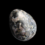 Indigo Gabbro Mystic Merlinite egg 111g in sunlight - Rocks and Things Store