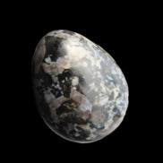 Indigo Gabbro Mystic Merlinite egg 111g in sunlight - Rocks and Things Store