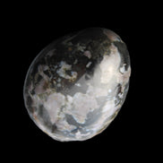 Indigo Gabbro Mystic Merlinite egg 111g in sunlight - Rocks and Things Store