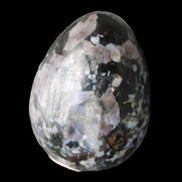 Indigo Gabbro Mystic Merlinite egg 111g in sunlight - Rocks and Things Store