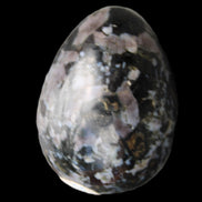Indigo Gabbro Mystic Merlinite egg 111g in sunlight - Rocks and Things Store