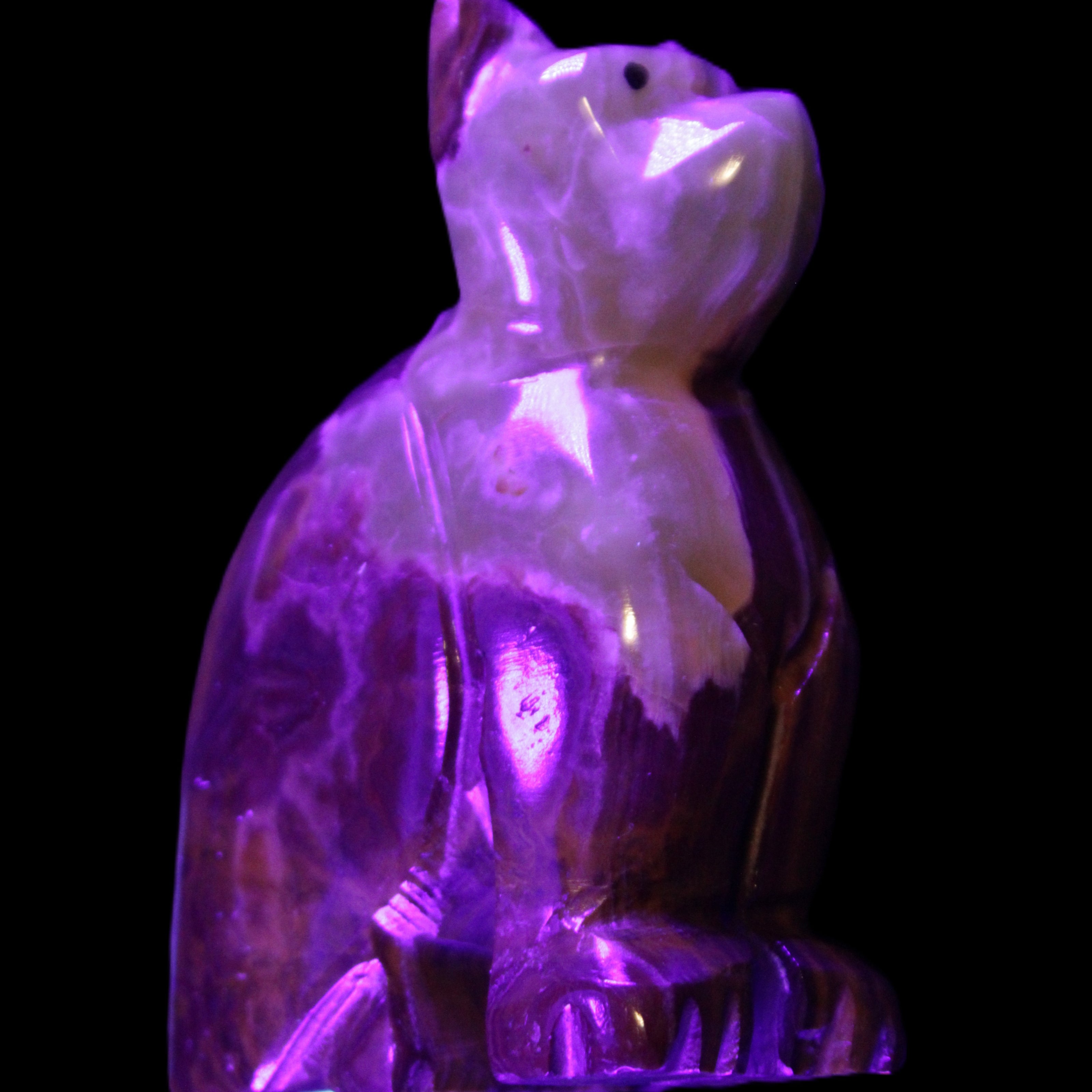 Afghan Jade hand-carved Cat 70*38*100mm 416g in UV light - Rocks and Things Store