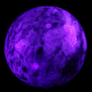 Pink Tourmaline sphere 60mm 357g in UV light - Rocks and Things Store