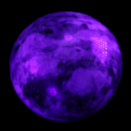 Pink Tourmaline sphere 60mm 357g in UV light - Rocks and Things Store