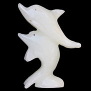 Afghan Jade hand-carved leaping Dolphin pair 42*42*110mm 267g in sunlight - Rocks and Things Store