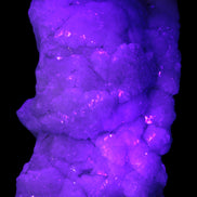 Calcite cluster 1345g in UV light - Rocks and Things Store
