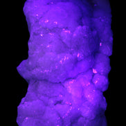 Calcite cluster 1345g in UV light - Rocks and Things Store