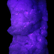 Calcite cluster 1345g in UV light - Rocks and Things Store
