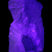 Calcite cluster 1345g in UV light - Rocks and Things Store