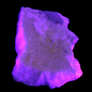 Calcite cluster 1345g in UV light - Rocks and Things Store