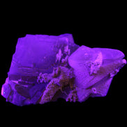 Clear Yellow Fluorite with 45mm dog-tooth Calcite 98*76*55mm 286g in UV light - Rocks and Things Store