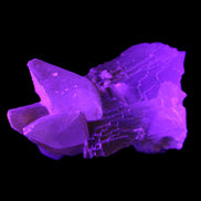 Clear Yellow Fluorite with 45mm dog-tooth Calcite 98*76*55mm 286g in UV light - Rocks and Things Store