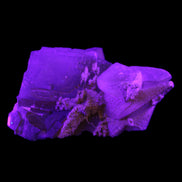 Clear Yellow Fluorite with 45mm dog-tooth Calcite 98*76*55mm 286g in UV light - Rocks and Things Store