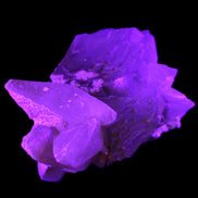 Clear Yellow Fluorite with 45mm dog-tooth Calcite 98*76*55mm 286g in UV light - Rocks and Things Store