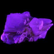 Clear Yellow Fluorite with 45mm dog-tooth Calcite 98*76*55mm 286g in UV light - Rocks and Things Store