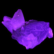 Clear Yellow Fluorite with 45mm dog-tooth Calcite 98*76*55mm 286g in UV light - Rocks and Things Store