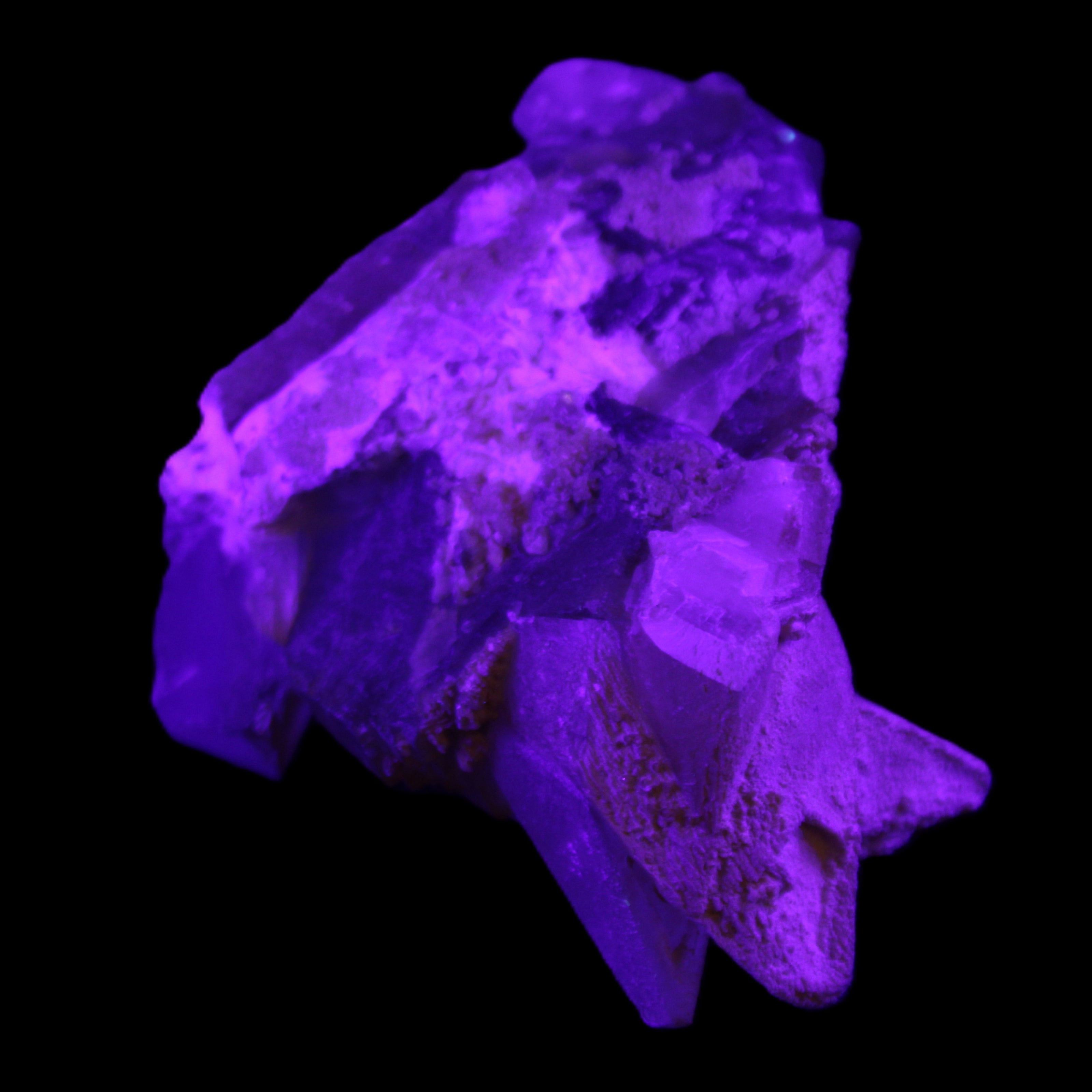 Clear Yellow Fluorite with 45mm dog-tooth Calcite 98*76*55mm 286g in UV light - Rocks and Things Store