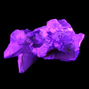 Clear Yellow Fluorite with 45mm dog-tooth Calcite 98*76*55mm 286g in UV light - Rocks and Things Store